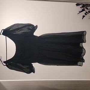 Black dress with puffed sleeves